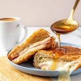 Combo #2 Ham and Cheese Croissant and Cafe Con Leche.