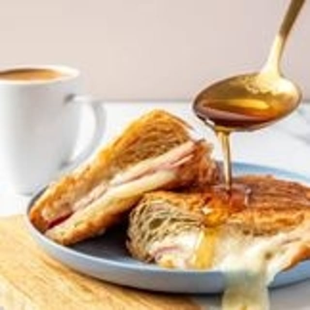 Combo #2 Ham and Cheese Croissant and Cafe Con Leche.